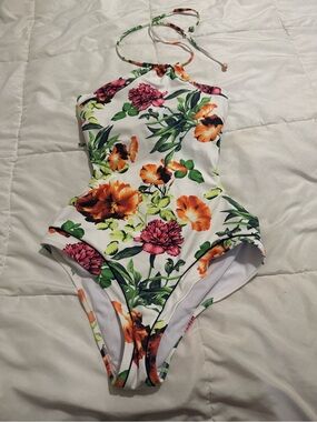 Beach Joy White Floral One-Piece Halter Swimsuit with cut out sides and low back